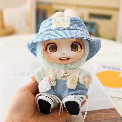 Cute doll wearing blue hat, shoes, and outfit from 5PCS-Set Cute Hat Shoes Doll Clothes accessory set for 15-17cm dolls