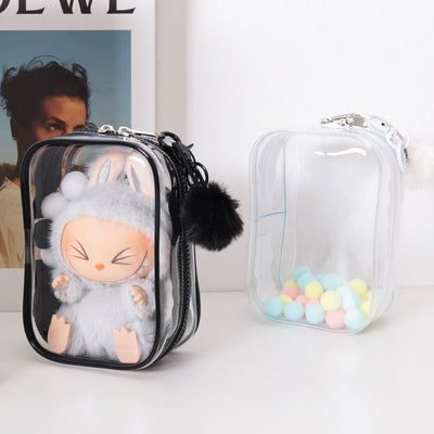 Set of customizable PVC transparent makeup bags with black and white trim, one containing a plush toy and the other with colorful balls inside