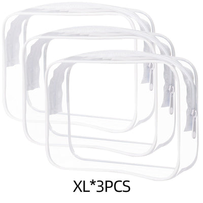 Set of three large transparent PVC makeup bags with white zippers and trim for portable storage