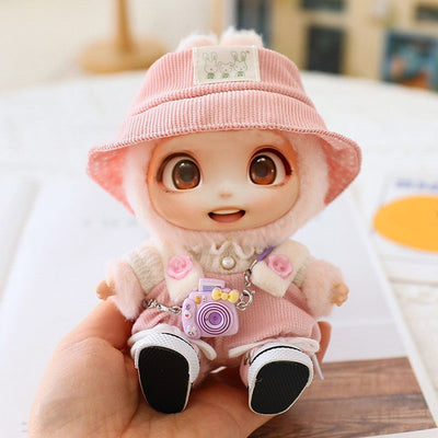 Cute doll wearing a pink hat, shoes, and outfit from 5PCS-Set Cute Hat Shoes Doll Clothes accessory set for 15-17cm dolls.